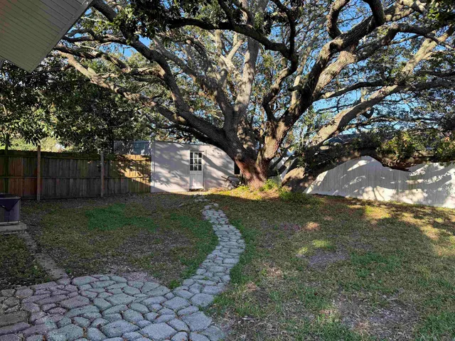 a bathroom with a sink a toilet and bathtub