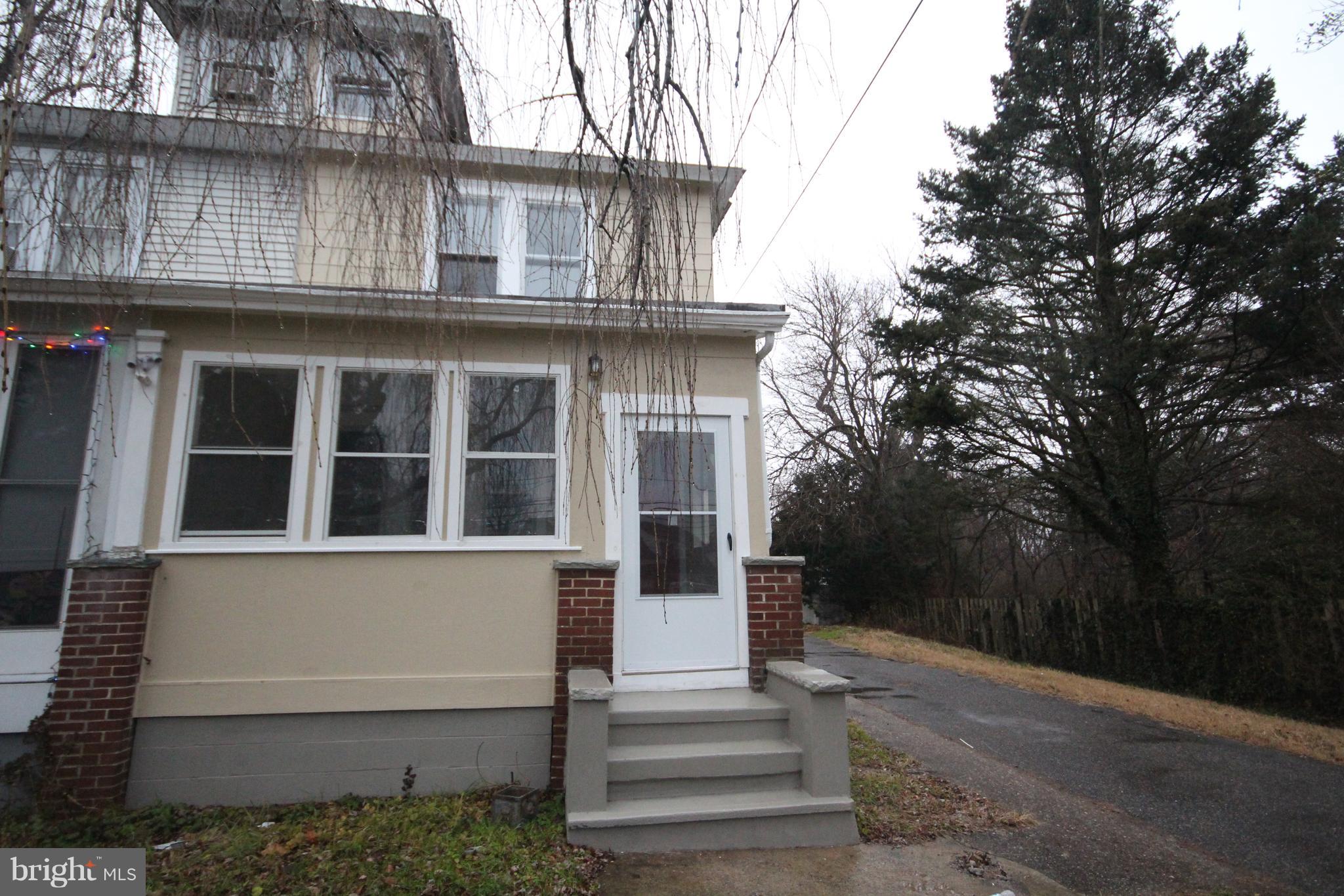 162 Edinburg Road Hamilton, NJ 08619 - Photo 1 of 17 a front view of a house with a yard