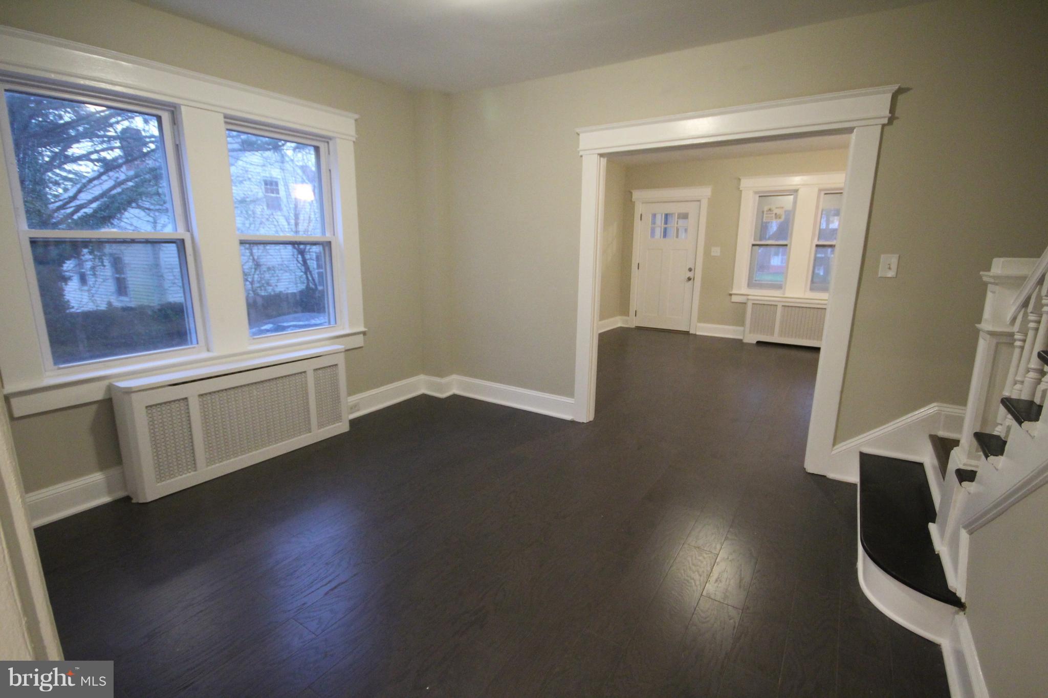 162 Edinburg Road Hamilton, NJ 08619 - Photo 6 of 17 a view of a livingroom with wooden floor and a window