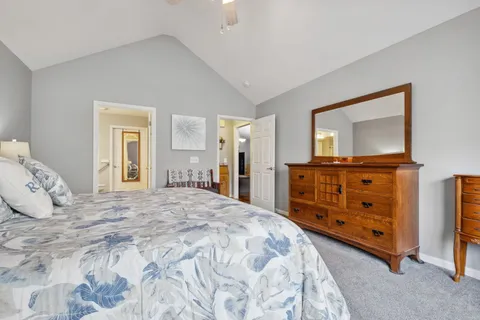 a bathroom with a sink vanity and a mirror