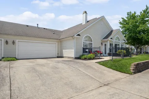 a view of a lake with sitting area