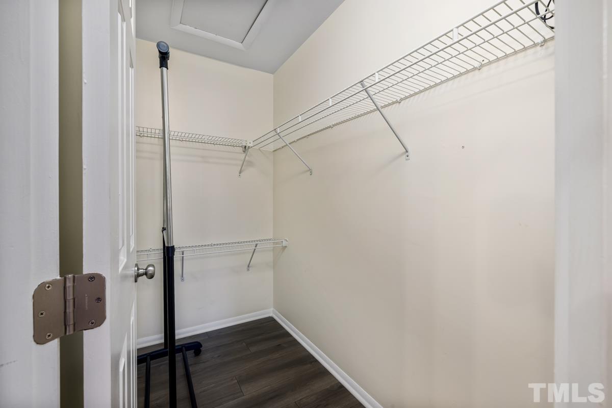 3702 Chimney Ridge Place, Unit 201 Durham, NC 27713 - Photo 17 of 27 a view of a room with wooden floor