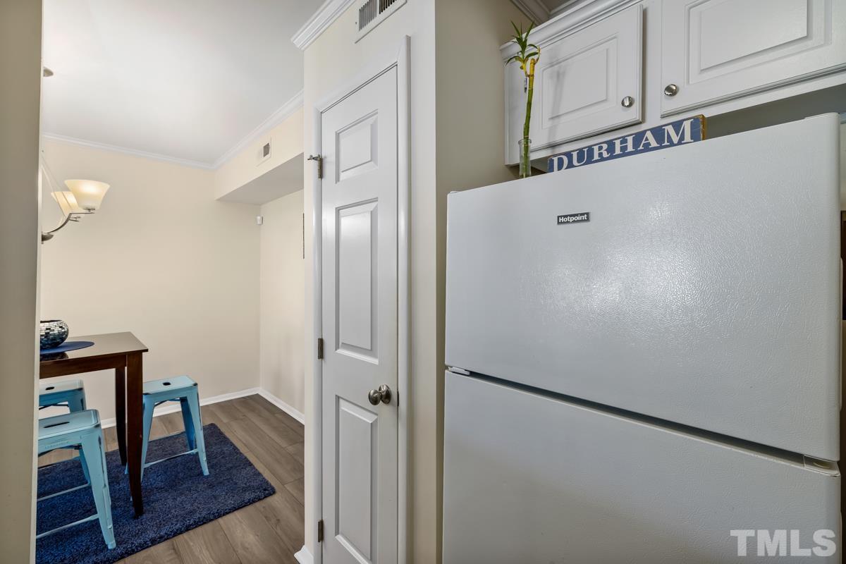 3702 Chimney Ridge Place, Unit 201 Durham, NC 27713 - Photo 22 of 27 a view of a hallway with wooden floor