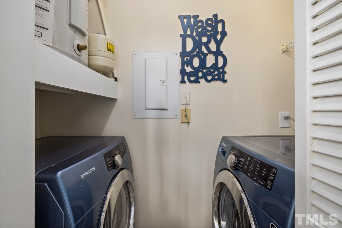 3702 Chimney Ridge Place, Unit 201 Durham, NC 27713 - Photo 23 of 27 a utility room with dryer and washer