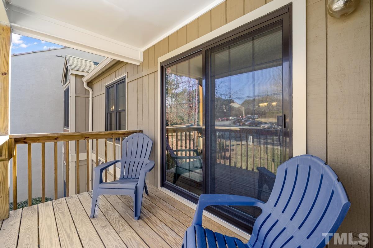 3702 Chimney Ridge Place, Unit 201 Durham, NC 27713 - Photo 24 of 27 a view of a balcony with wooden floor