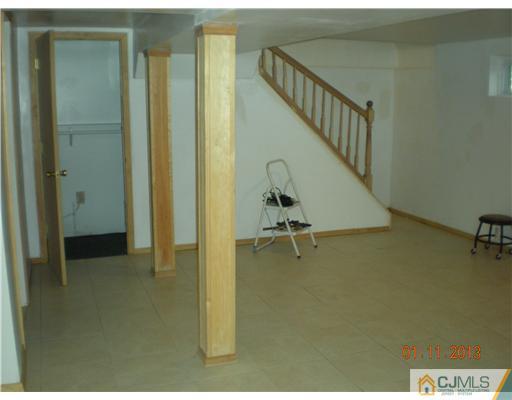 11 Stevens Road Edison, NJ 08817 - Photo 9 of 14 a view of an empty room and a bathroom
