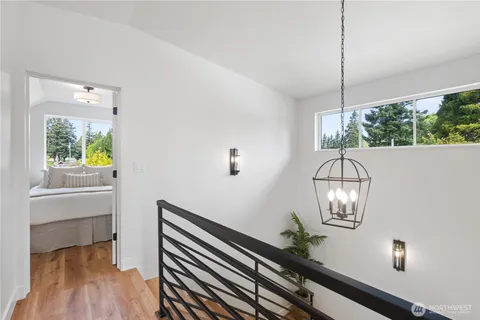 a view of living room with furniture and a large window