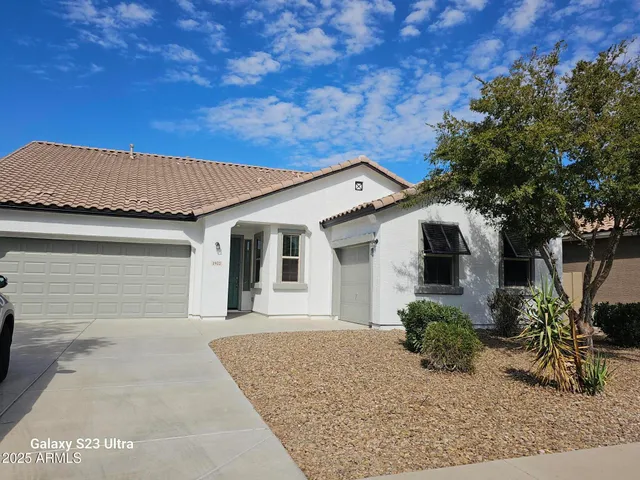 a bed room with a bed and a couch