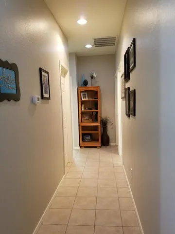 a kitchen with stainless steel appliances granite countertop a sink a refrigerator and a stove