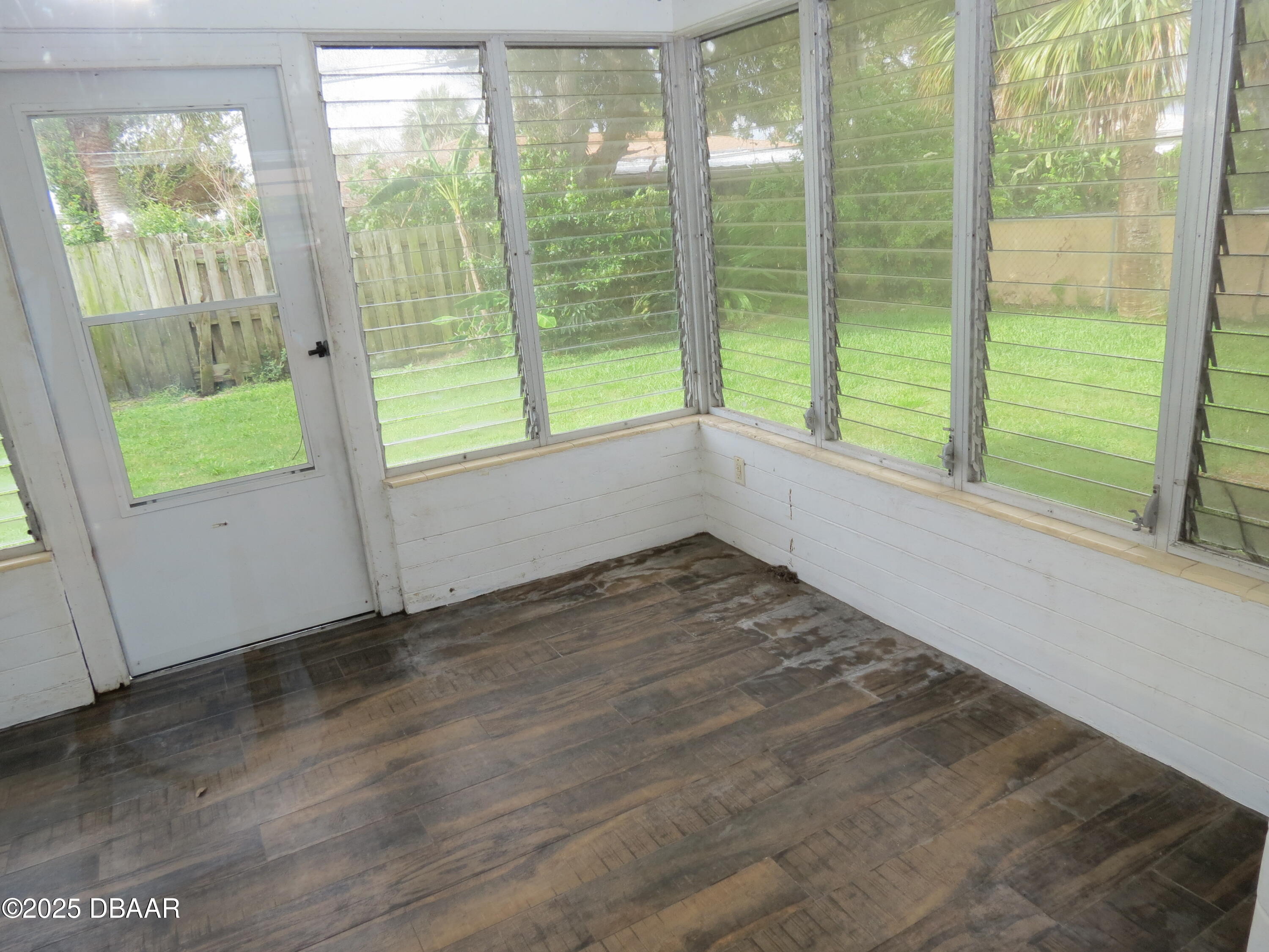 221 Williams Avenue Daytona Beach, FL 32118 - Photo 10 of 15 a view of an empty room and wooden floor