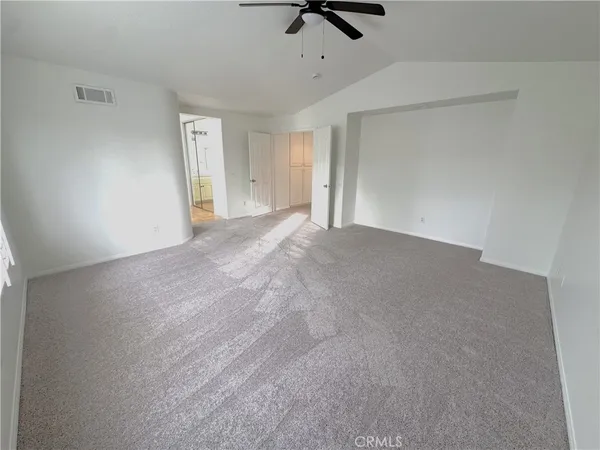 a view of staircase with white door