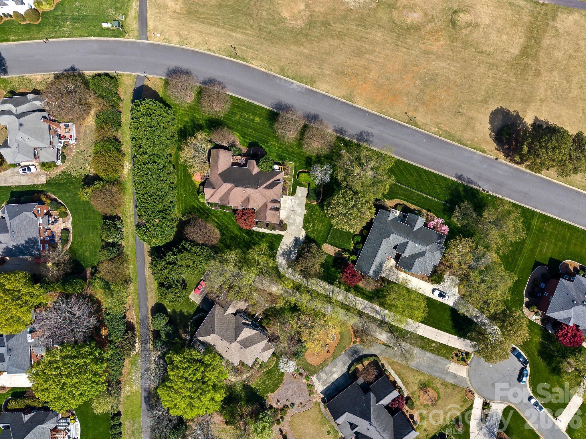 3530 Cardiff Lane Matthews, NC 28104 - Photo 39 of 39 an aerial view of a house a garden and plants