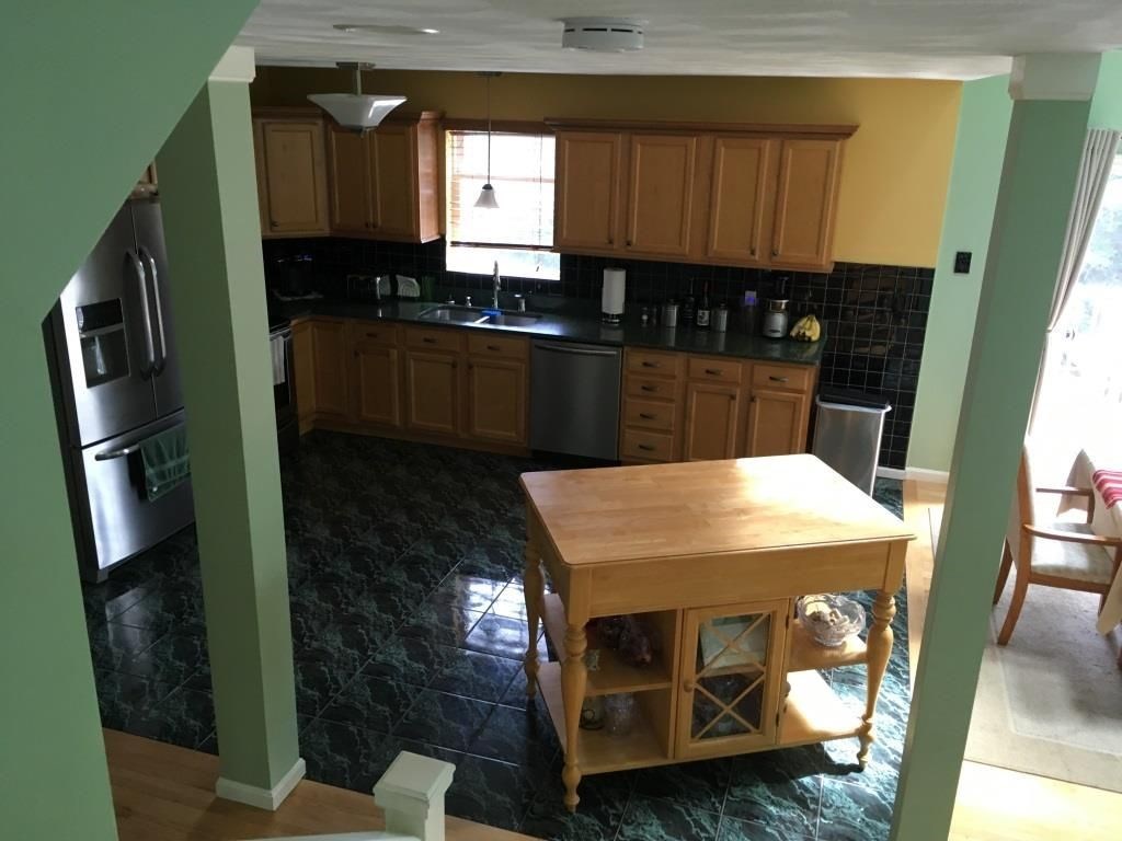 40 Crompton Road East Greenwich, RI 02818 - Photo 4 of 17 Updated kitchen with movable island and stainless steel appliances.