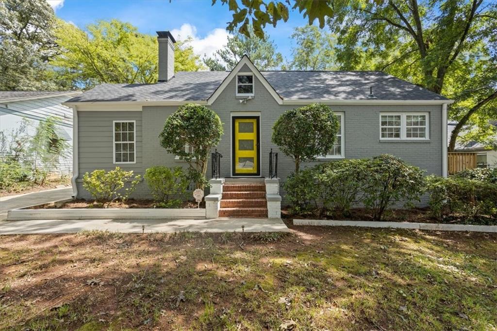 1816 Sylvan Road Southwest Atlanta, GA 30310 - Photo 1 of 1 a front view of a house with a yard