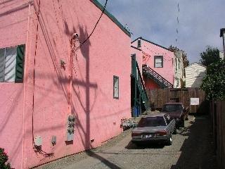 241 Kentucky Street Vallejo, CA 94590 - Photo 2 of 8 a view of a brick house with many windows