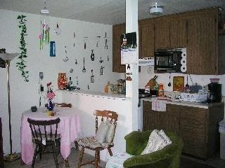 241 Kentucky Street Vallejo, CA 94590 - Photo 4 of 8 a kitchen with granite countertop a sink and a stove top oven