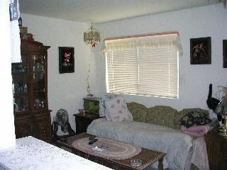 241 Kentucky Street Vallejo, CA 94590 - Photo 5 of 8 a living room with furniture and a window
