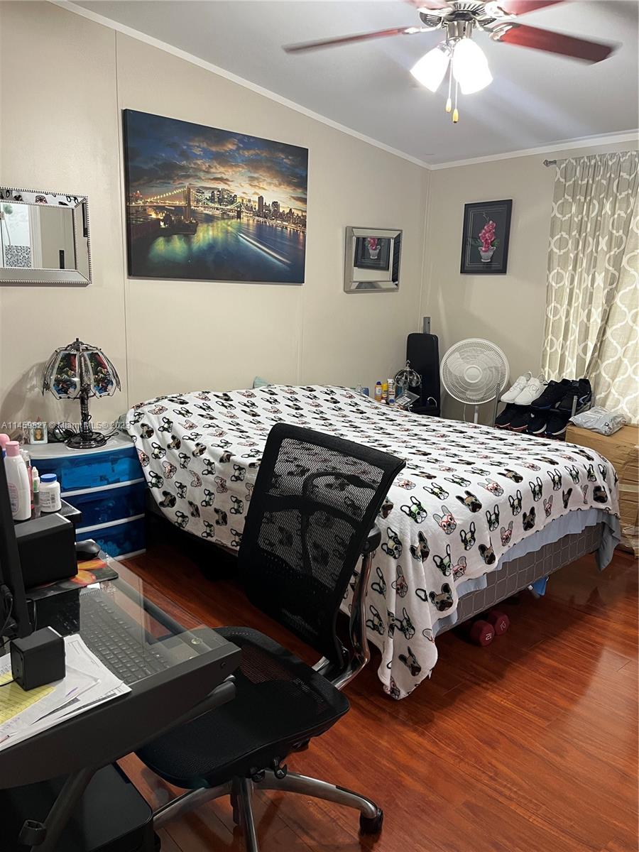 28501 Southwest 152nd Avenue Homestead, FL 33033 - Photo 12 of 32 a bedroom with bed and a window