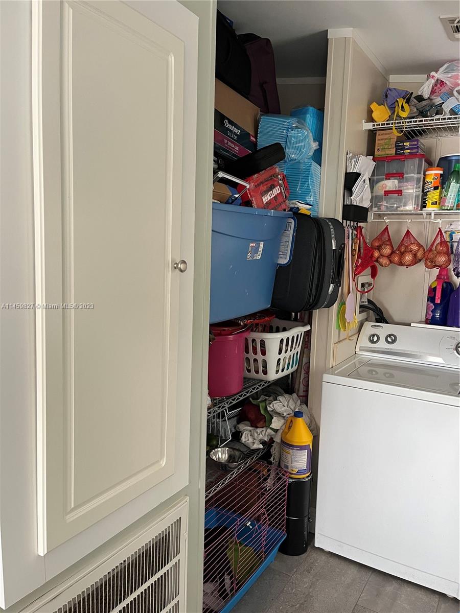28501 Southwest 152nd Avenue Homestead, FL 33033 - Photo 6 of 32 a room with storage and utility