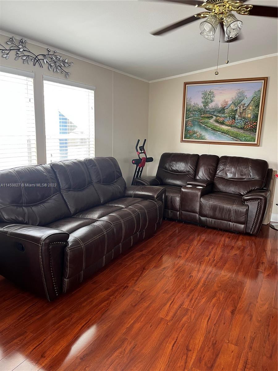 28501 Southwest 152nd Avenue Homestead, FL 33033 - Photo 8 of 32 a living room with furniture and a window