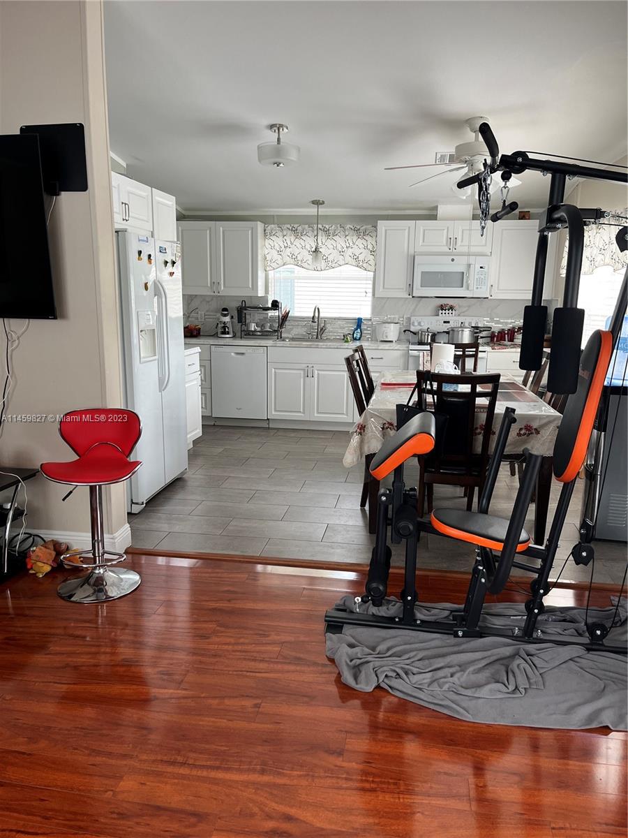 28501 Southwest 152nd Avenue Homestead, FL 33033 - Photo 10 of 32 a view of a room with gym equipment