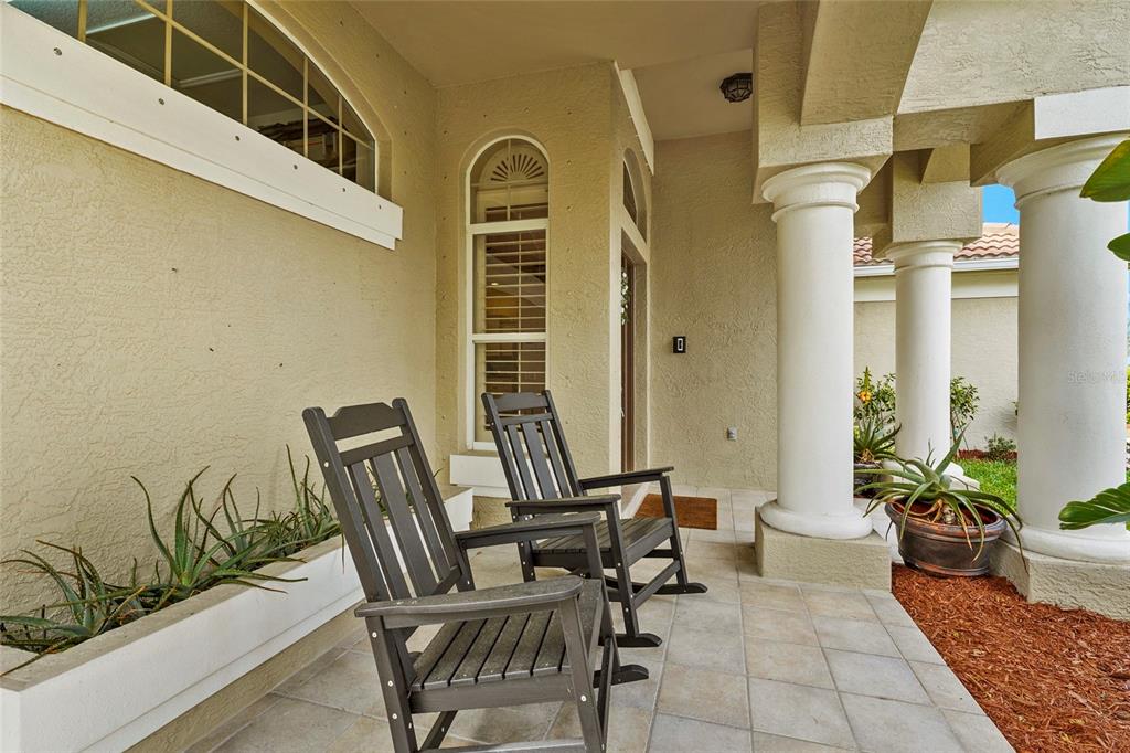 6582 Waters Edge Way Lakewood Ranch, FL 34202 - Photo 11 of 98 a view of a patio with couple of chairs