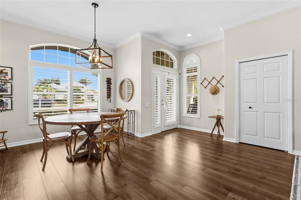 6582 Waters Edge Way Lakewood Ranch, FL 34202 - Photo 23 of 98 a view of a livingroom with furniture window and wooden floor