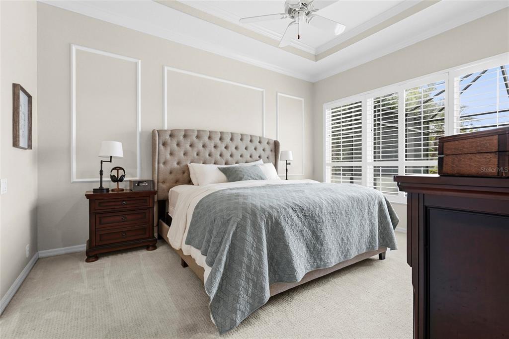 6582 Waters Edge Way Lakewood Ranch, FL 34202 - Photo 26 of 98 a bed room with a bed and a television