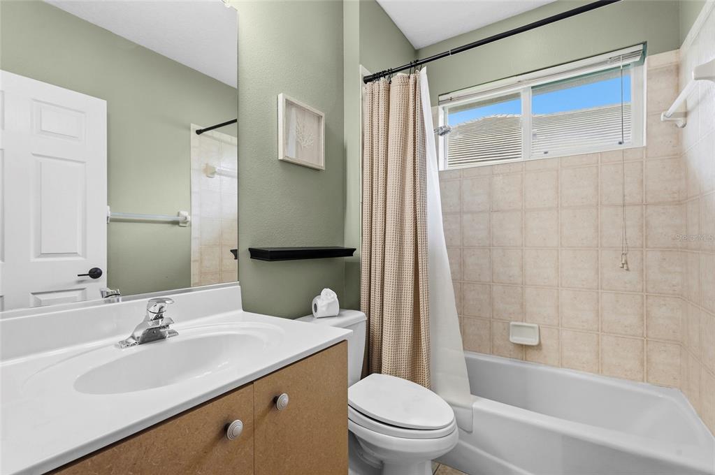 6582 Waters Edge Way Lakewood Ranch, FL 34202 - Photo 41 of 98 a bathroom with a sink toilet and shower