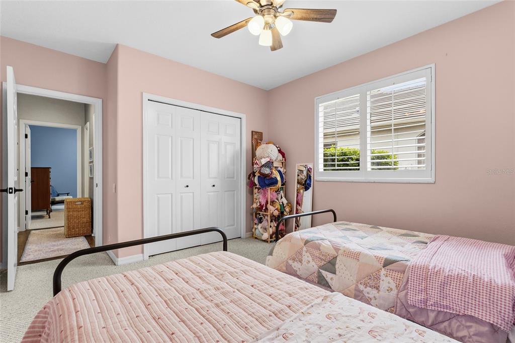 6582 Waters Edge Way Lakewood Ranch, FL 34202 - Photo 44 of 98 a bedroom with bed and a window