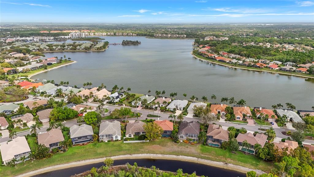 6582 Waters Edge Way Lakewood Ranch, FL 34202 - Photo 66 of 98 an aerial view of residential houses with outdoor space