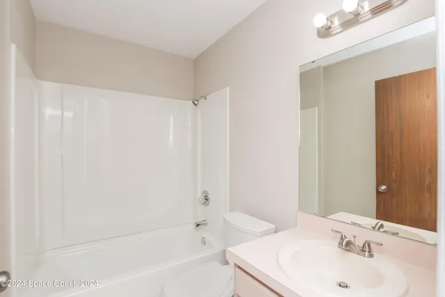 a bathroom with a sink and a bathtub