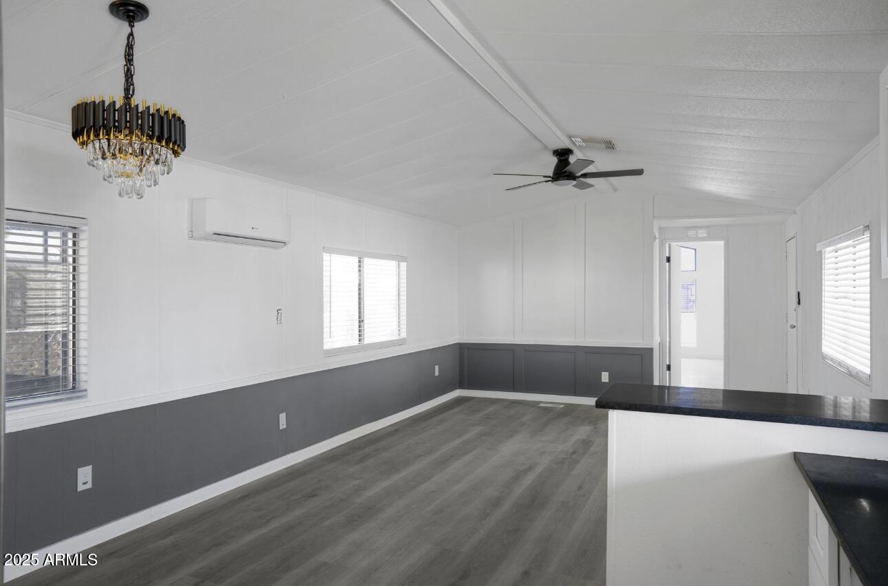 805 North Dysart Road, Unit 33 Avondale, AZ 85323 - Photo 11 of 18 a view of a livingroom with a ceiling fan and window