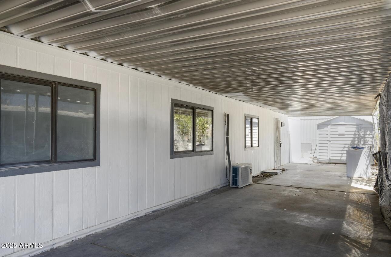 805 North Dysart Road, Unit 33 Avondale, AZ 85323 - Photo 5 of 18 a view of a hallway with windows