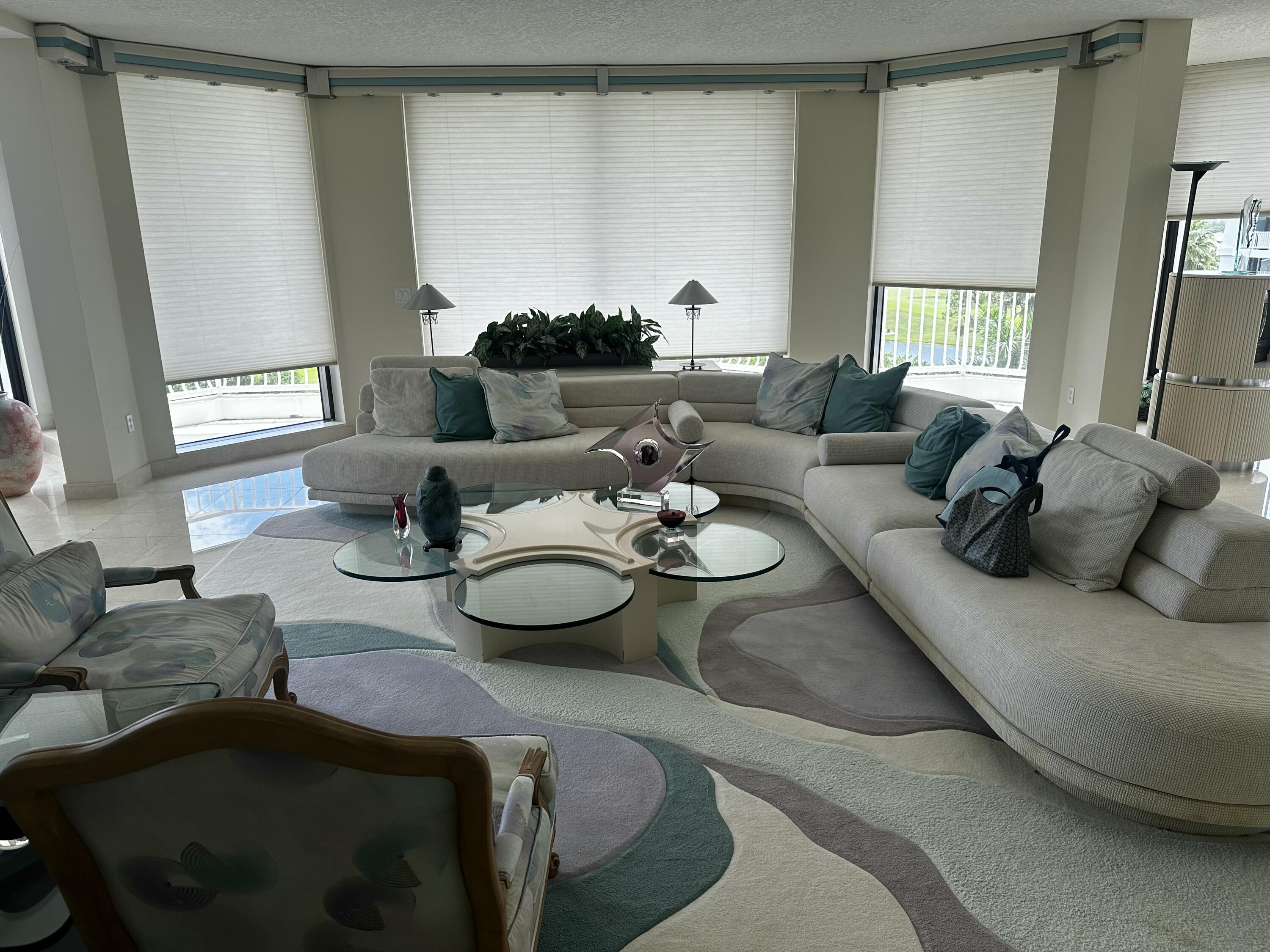 20320 Fairway Oaks Drive, Unit 373 Boca Raton, FL 33434 - Photo 15 of 27 a living room with furniture and a large window
