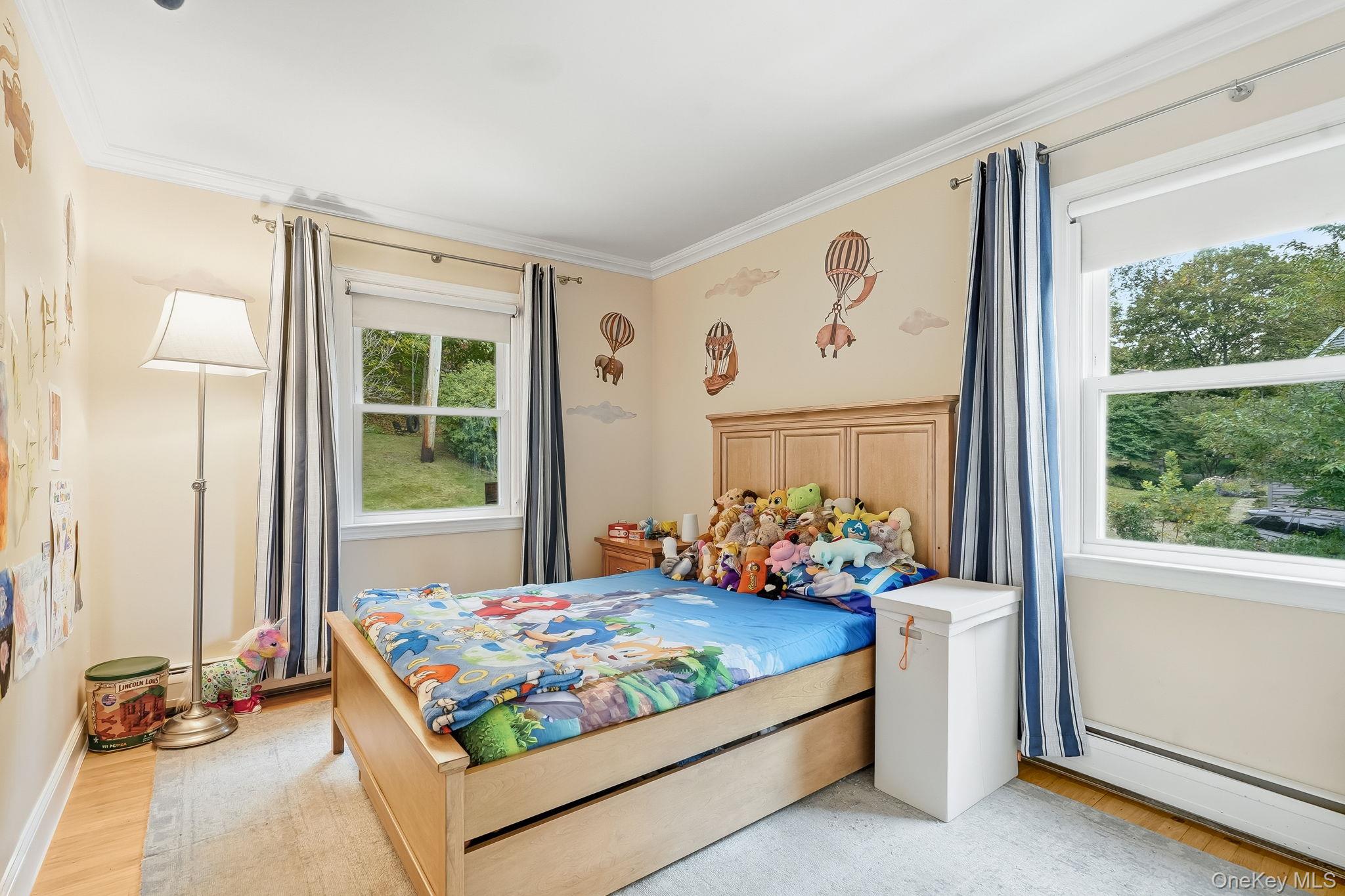 37 Tulip Road Briarcliff Manor, NY 10510 - Photo 14 of 27 a bedroom with a bed and window