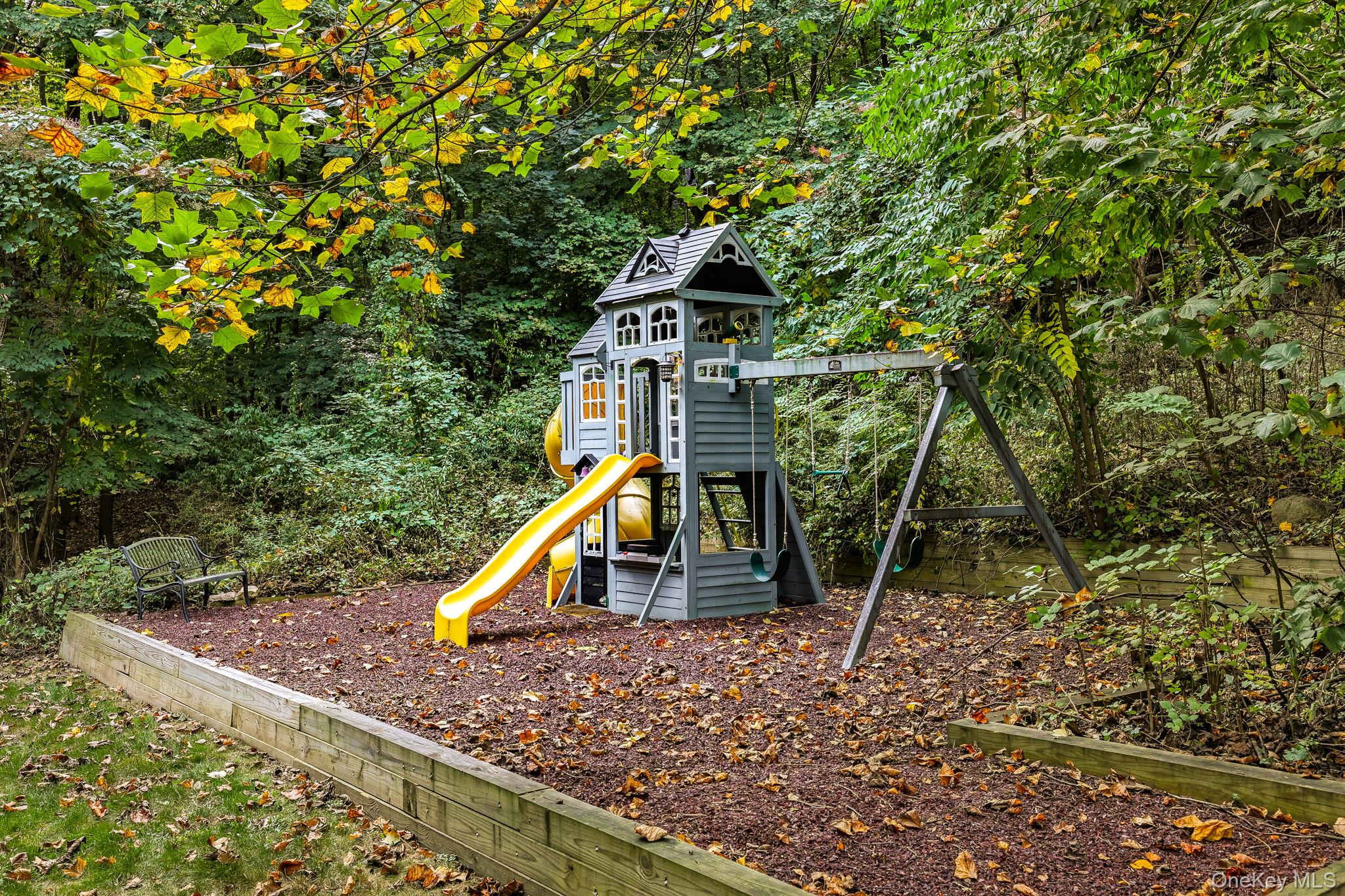 37 Tulip Road Briarcliff Manor, NY 10510 - Photo 17 of 27 a view of a wooden deck and trees