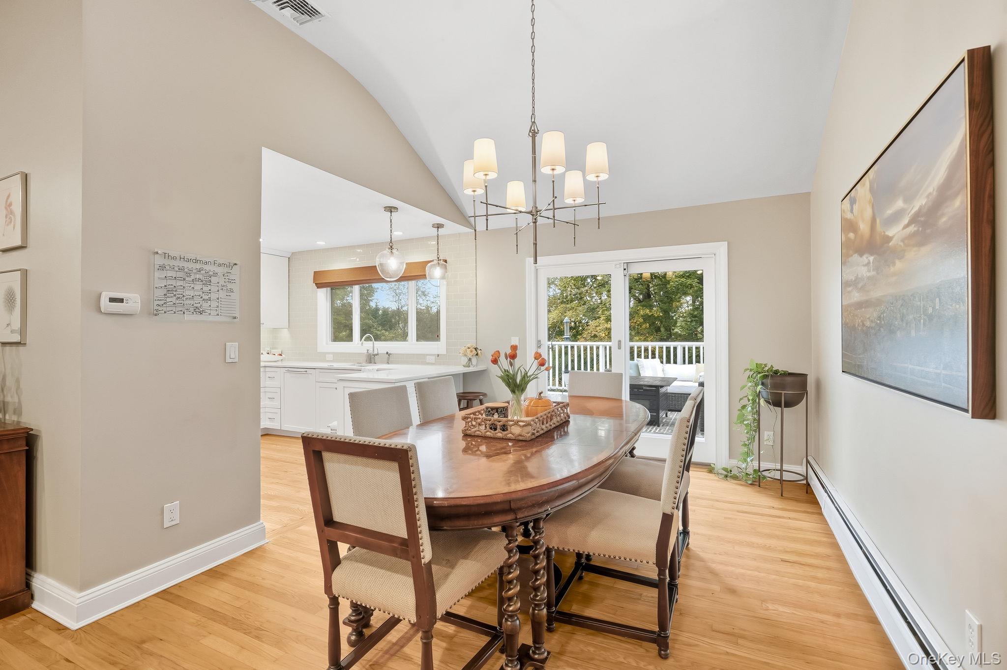 37 Tulip Road Briarcliff Manor, NY 10510 - Photo 6 of 27 a view of a dining room with furniture wooden floor and chandelier