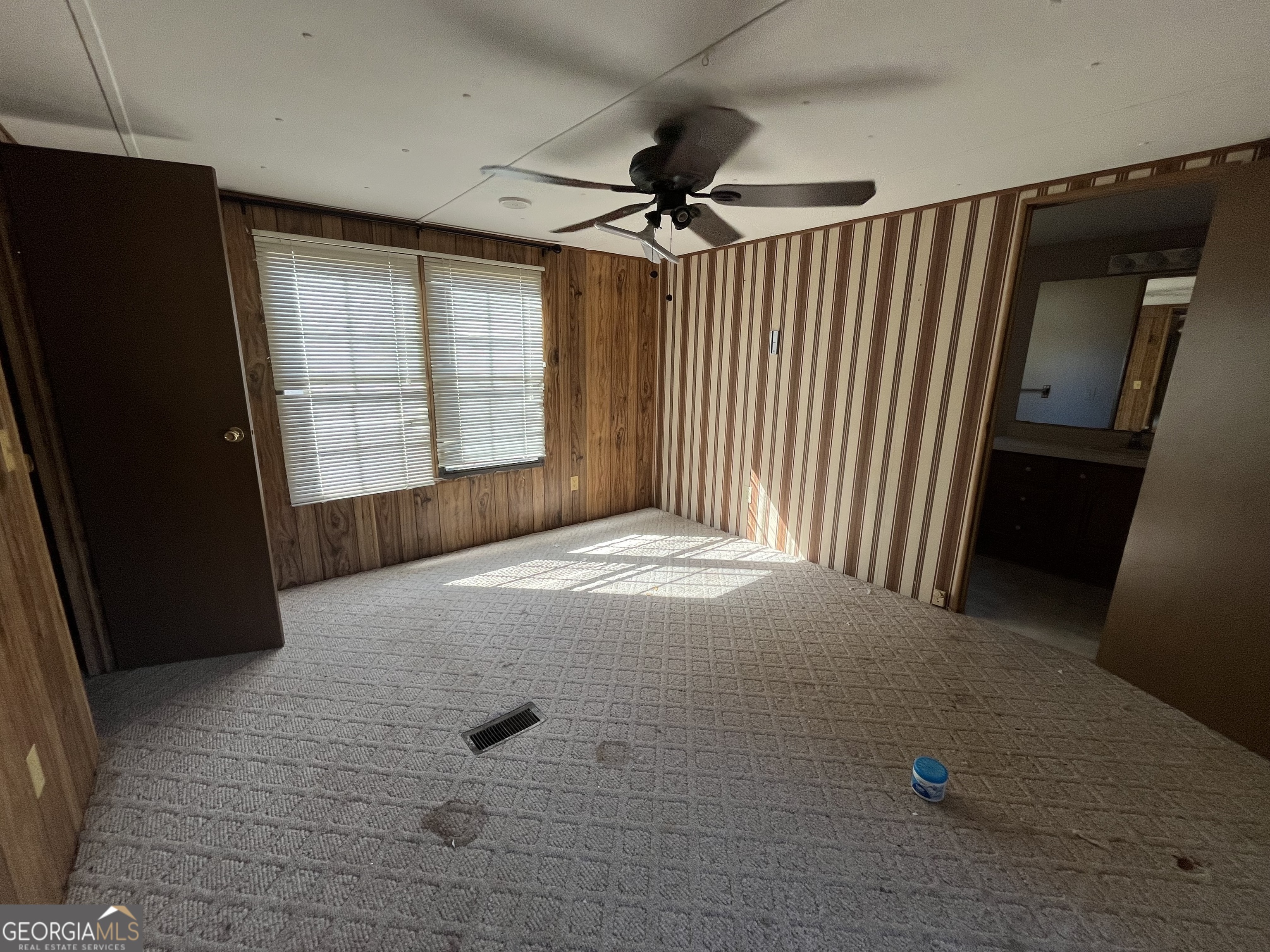 6330 Riggins Mill Road Dry Branch, GA 31020 - Photo 14 of 108 a view of empty room with windows