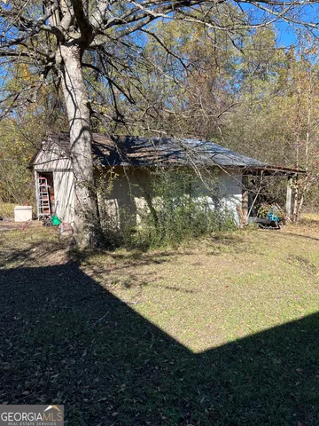 a view of deck with wooden floor and outdoor seating