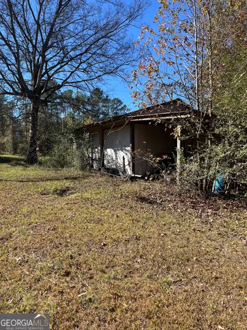 a room with furniture and a flat screen tv