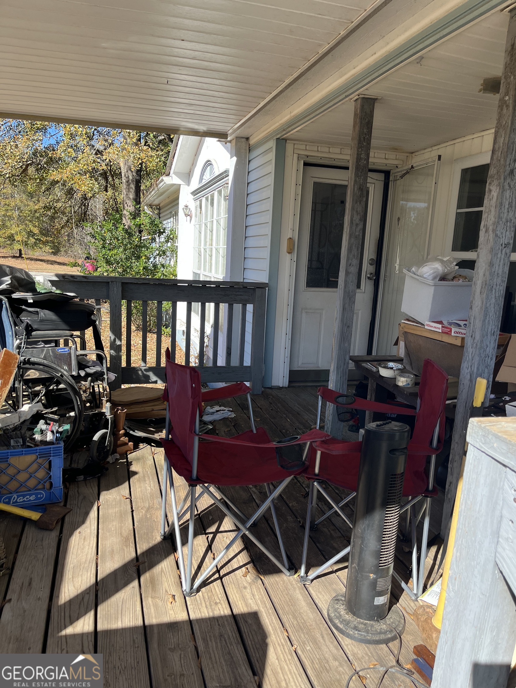 6330 Riggins Mill Road Dry Branch, GA 31020 - Photo 24 of 108 a view of a balcony with chairs