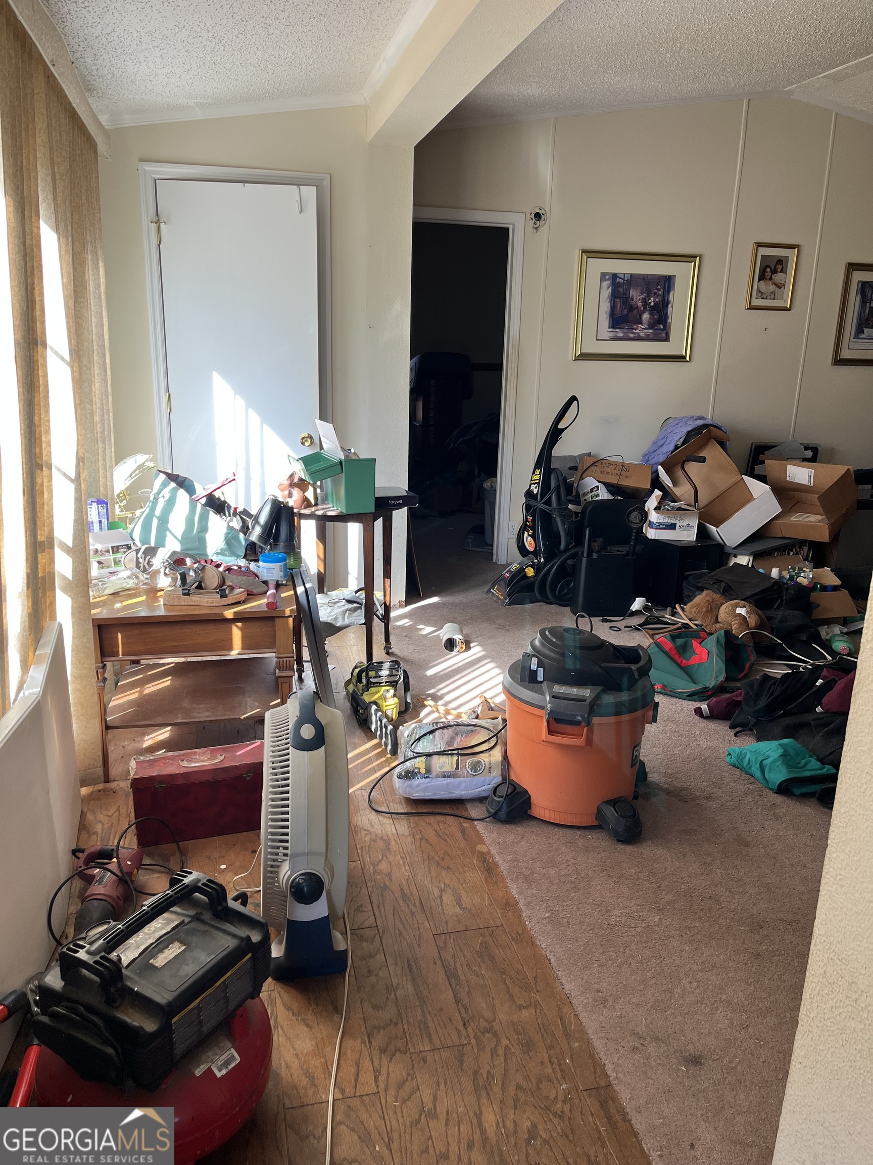 6330 Riggins Mill Road Dry Branch, GA 31020 - Photo 25 of 108 a room with gym equipment and a window