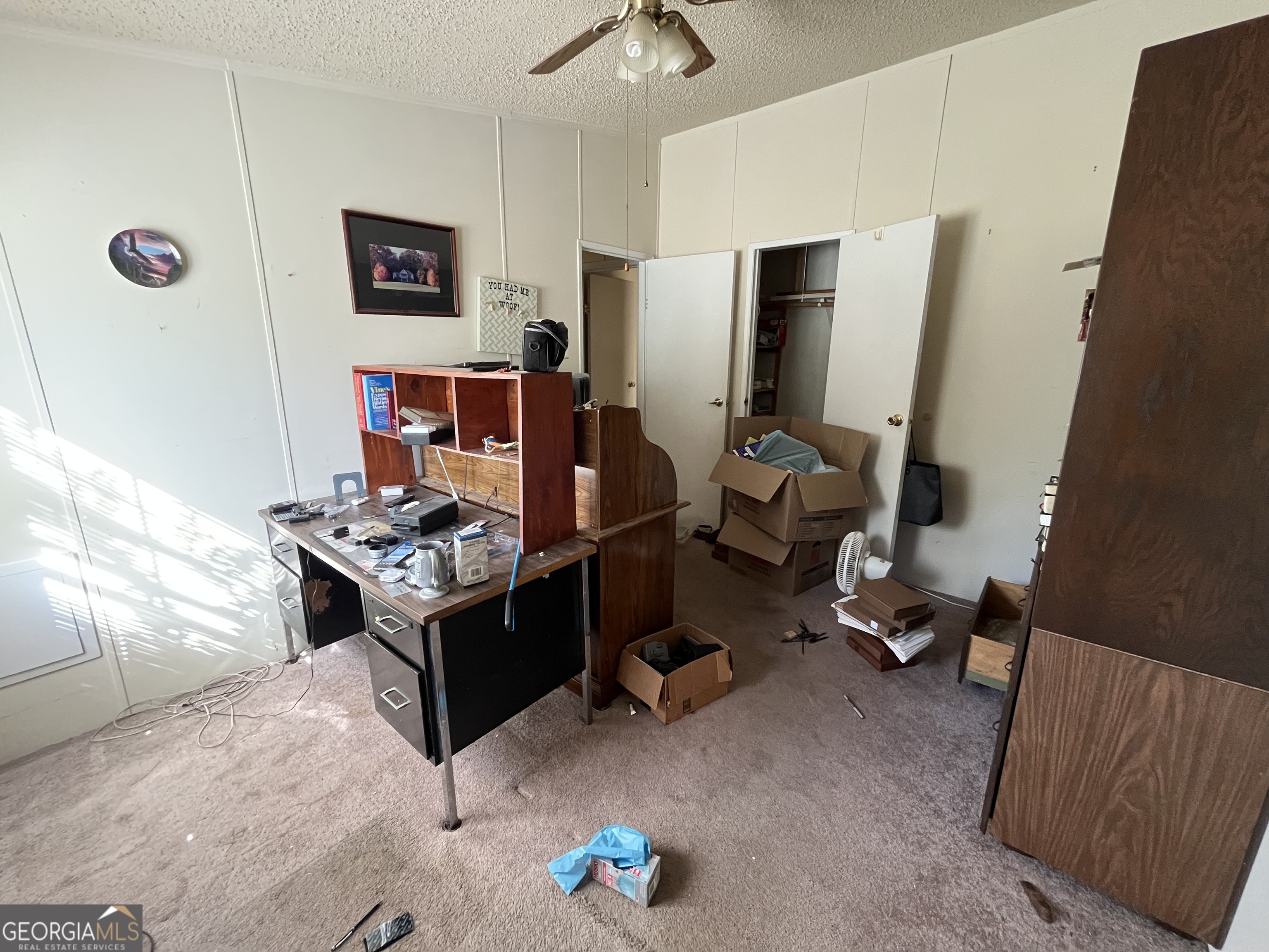 6330 Riggins Mill Road Dry Branch, GA 31020 - Photo 36 of 108 a room with furniture and a flat screen tv