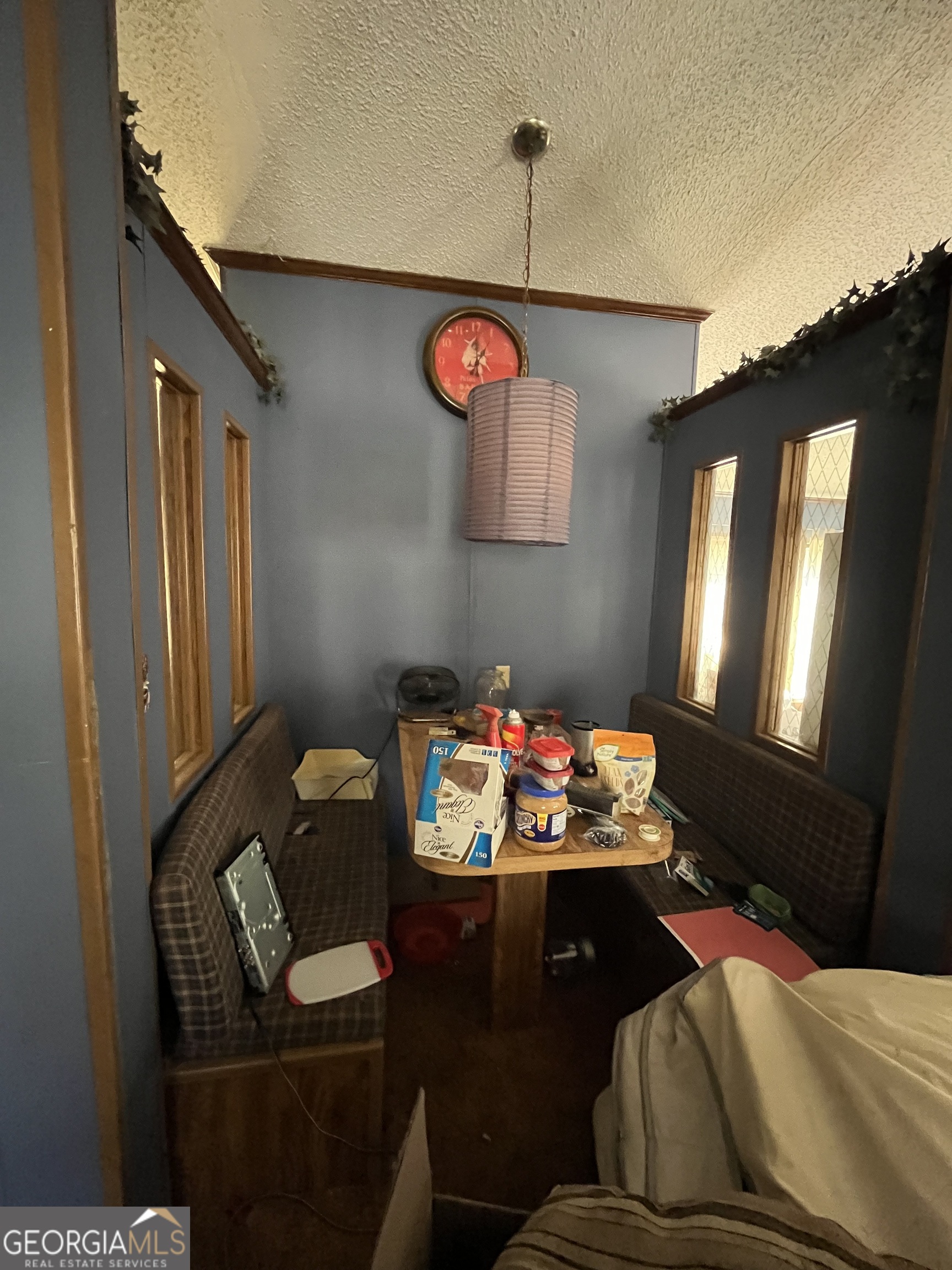 6330 Riggins Mill Road Dry Branch, GA 31020 - Photo 68 of 108 a bedroom with a bed and wooden floor