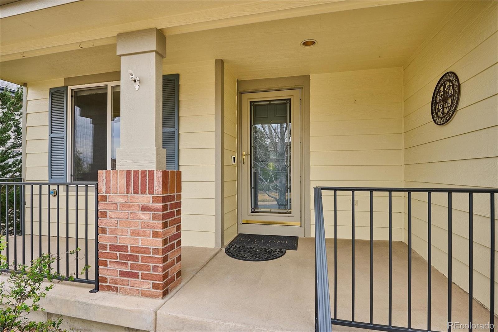 6299 Shannon Trail Highlands Ranch, CO 80130 - Photo 2 of 40 a view of entryway door