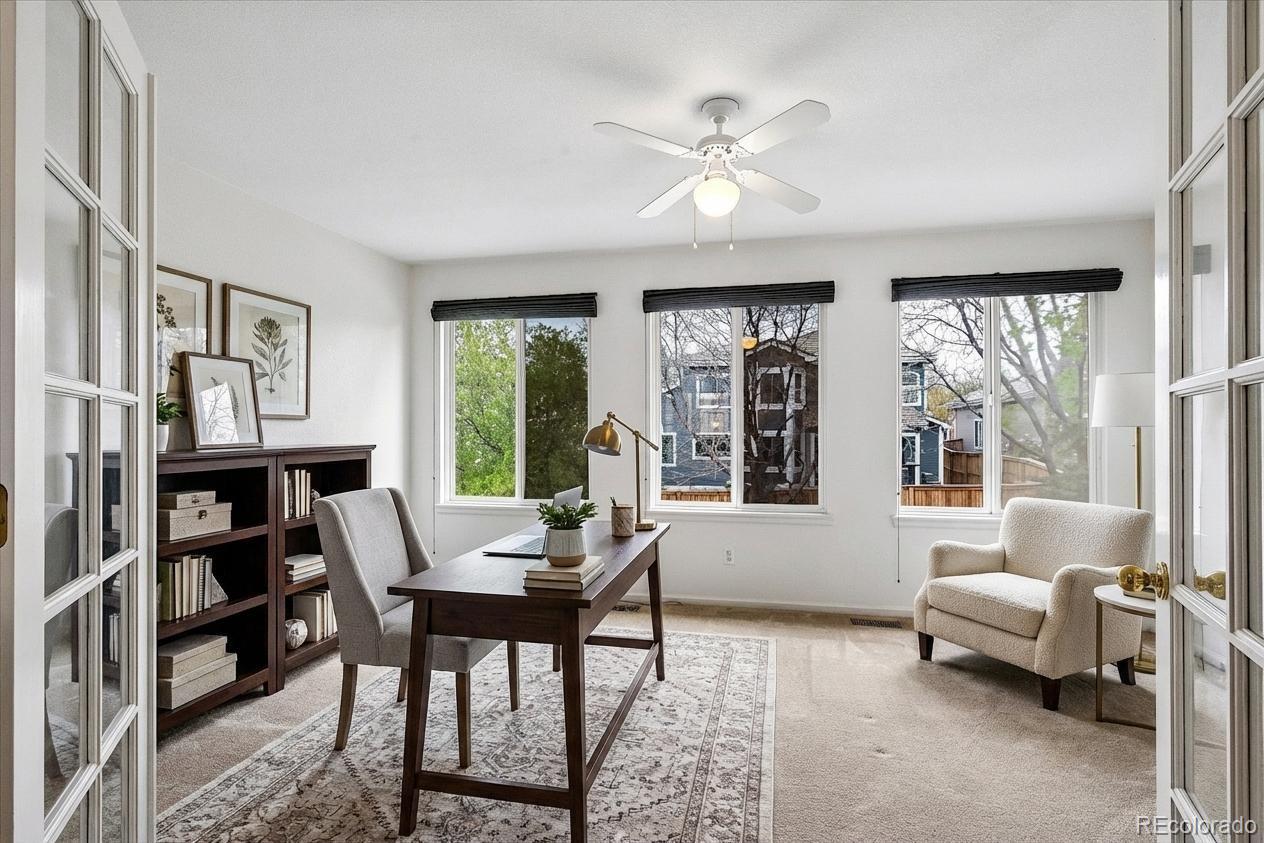 6299 Shannon Trail Highlands Ranch, CO 80130 - Photo 21 of 40 a workspace with furniture window and wooden floor