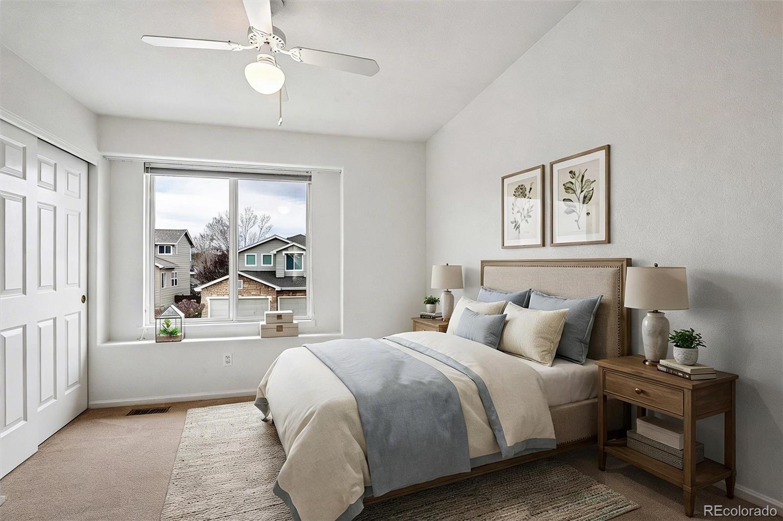 6299 Shannon Trail Highlands Ranch, CO 80130 - Photo 23 of 40 a bedroom with a large bed and a window