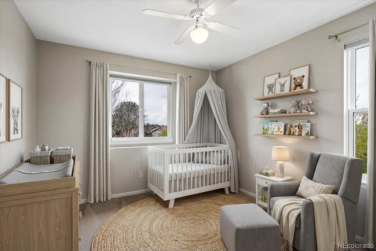 6299 Shannon Trail Highlands Ranch, CO 80130 - Photo 28 of 40 a bedroom with furniture and a window