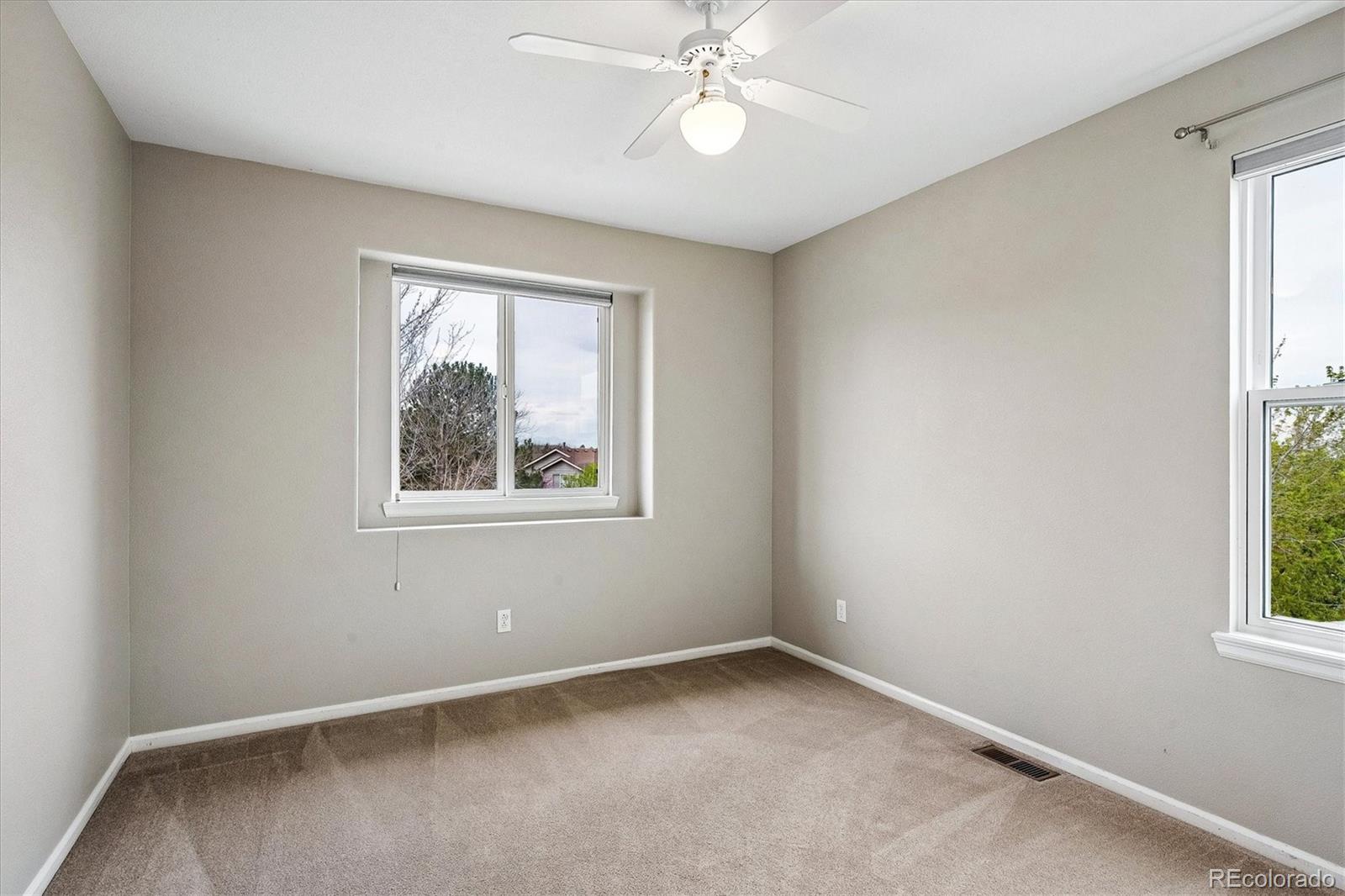 6299 Shannon Trail Highlands Ranch, CO 80130 - Photo 29 of 40 an empty room with a window